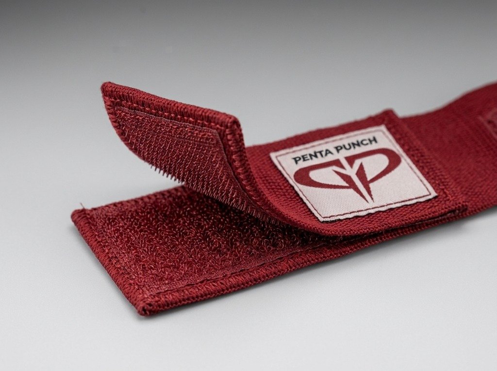 Boxing hand wrap closure strap featuring high-density nylon hook-and-loop velcro and custom woven patch